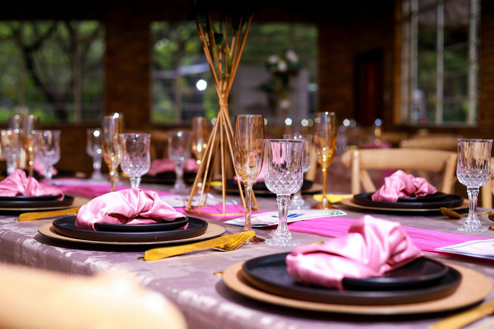Fine dining table setting with pink flowers Cheshire